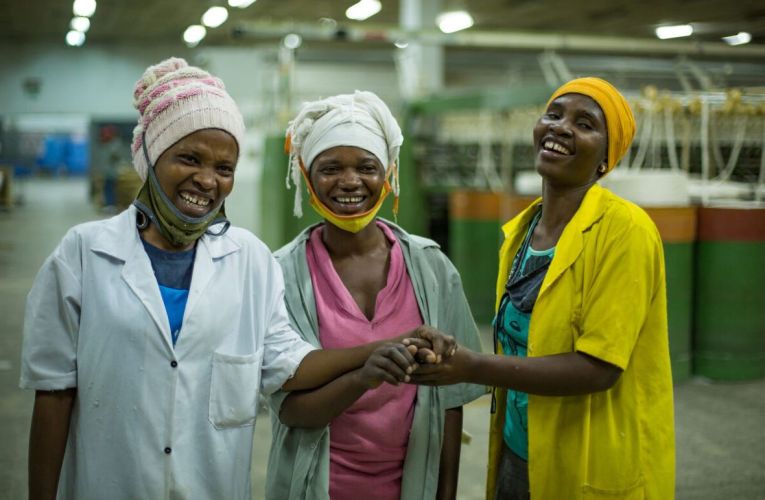 workers in a GOTS-certified facility in Tanzania